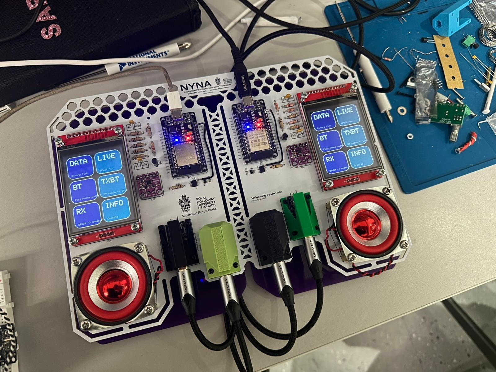 Assembled NYNA optical wireless transceiver with dual touchscreens and speakers